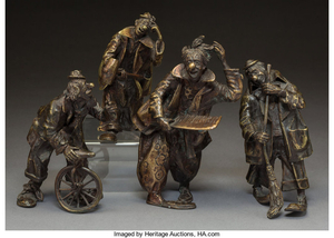 A Group of Four Italian Partial-Gilt Patinated Bronze Clown Figures (20th century )