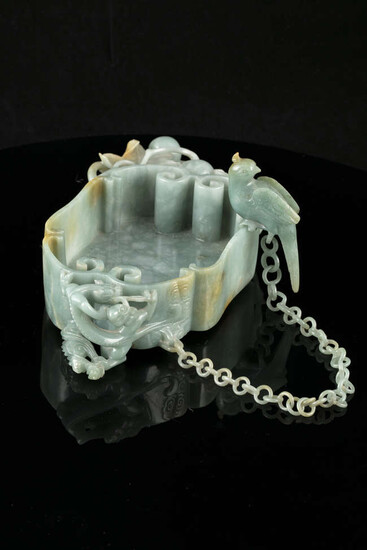 A LINGZHI-SHAPED JADEITE JADE BRUSHWASHER WITH A PARROT...