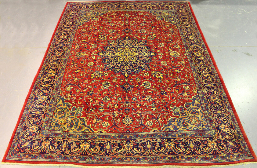 A Mahal carpet, North-west Persia, late 20th century, the red field with a shaped flowerhead medalli