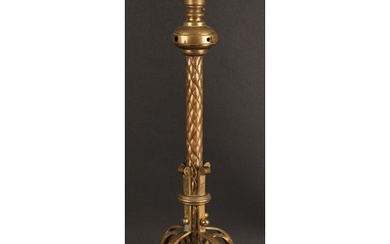 A Neo Gothic brass and copper table lamp, in the manner of W...