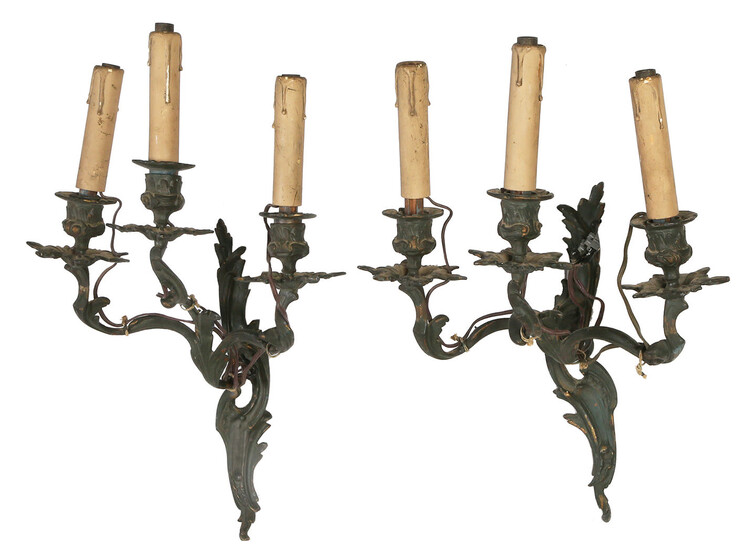 A PAIR OF ROCOCO STYLE THREE LIGHT WALL SCONCES