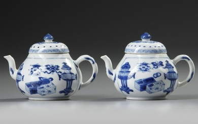 A PAIR OF SMALL CHINESE BLUE AND WHITE TEAPOTS AND