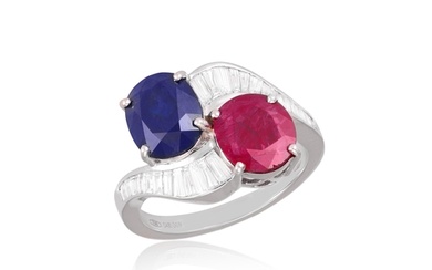 A RUBY, SAPPHIRE AND DIAMOND DRESS RING Of crossover design...