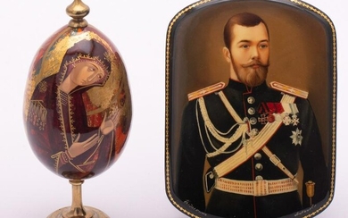 A Russian Hand Painted Lacquer Easter Egg, with a