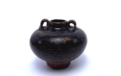 A South Chinese Brown Glazed Footed Jarlet with Twin Ear Detail, Ming Dynasty
