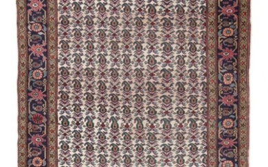 A Turkish rug, all over boteh design on an ivory field. Second...
