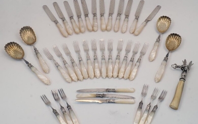 A Victorian set of mother-of-pearl handled cutlery, with silver acanthus chased collars and silver plated blades, bowls, and prongs, Sheffield, 1883, comprising four serving spoons with shell bowls, twelve dessert forks, and eleven table knives...