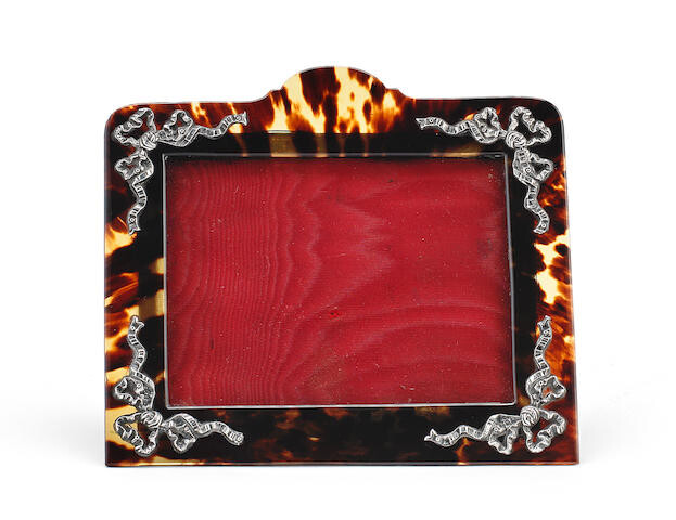 A Victorian silver-mounted tortoiseshell photograph frame