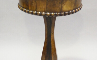 A William IV rosewood jardinière table, the interior fitted with a brass pan, the tapering side