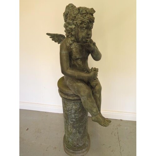 A bronze figural water feature of a fairy on a column, 135cm...