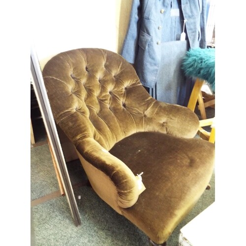 A vintage button back parlour chair having brown upholstery ...