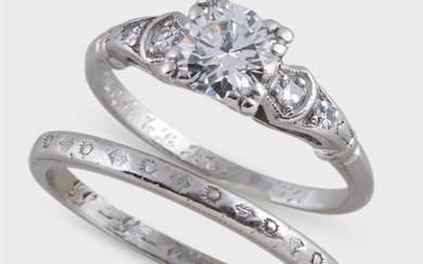 A diamond and platinum engagement ring and wedding band...