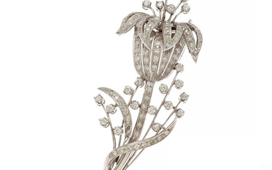 A diamond brooch in the shape of a flower set with numerous brilliant and single-cut diamonds, mounted in 18k white gold. L. app. 7 cm. Circa 1950.