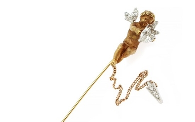 A diamond pin in the shape of a putto set with a heart-shaped diamond weighing app. 0.80 ct. and numerous diamonds, mounted in 14k and 18k gold and white gold.