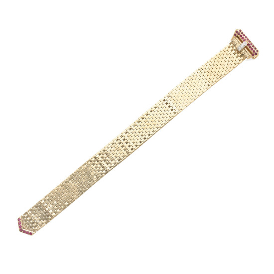 A gold, ruby and diamond buckle bracelet