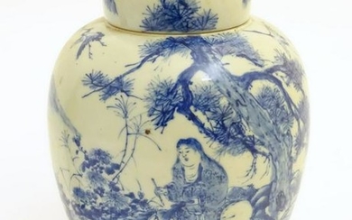 A large blue and white Japanese lidded ginger jar