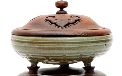 A large celadon censer with Taoist symbols