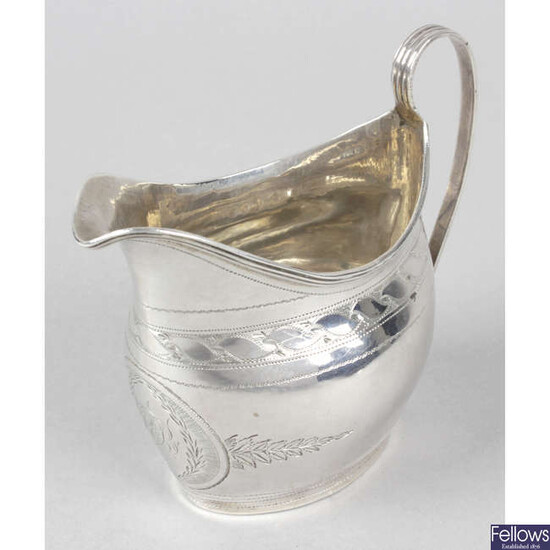 A late George III silver cream jug.