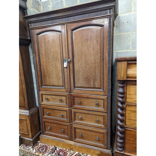 A late Victorian mahogany press cupboard (altered), width 11...