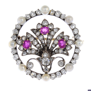 A late Victorian silver and gold, ruby, diamond and seed pearl brooch.