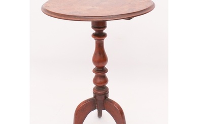 A mid-19th century mahogany tilt-top tripod table - the moul...