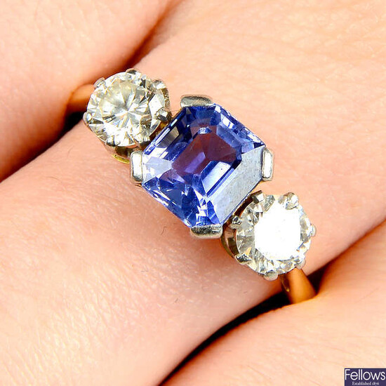 A mid 20th century 18ct gold and platinum, sapphire and brilliant-cut diamond three-stone ring.