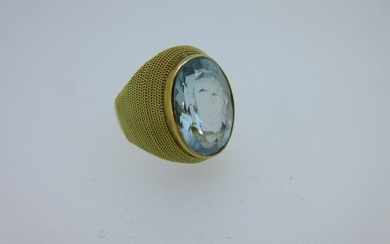 A modern single stone aquamarine ring