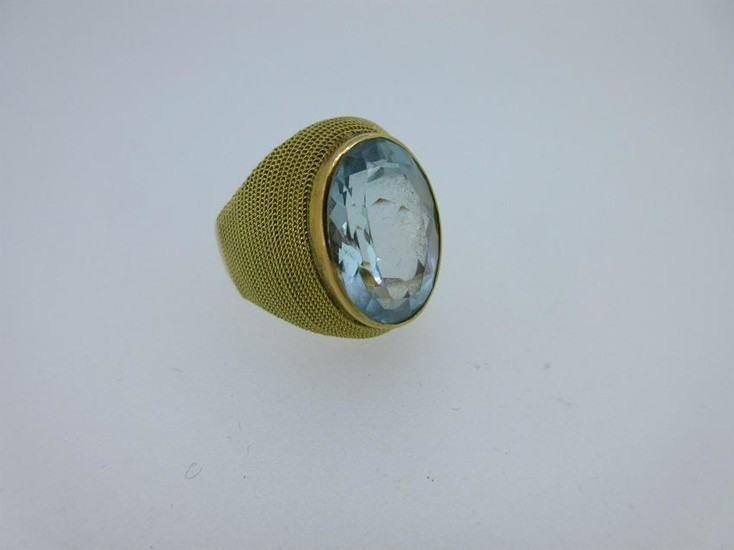 A modern single stone aquamarine ring