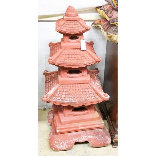 A painted reconstituted stone sectional pagoda garden orname...