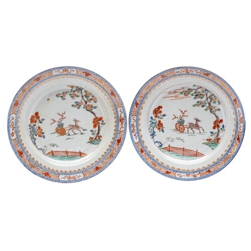 A pair of Chinese verte-imari chargers: each painted with a ...