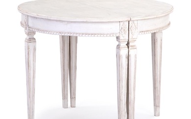 A pair of Swedish 'demi lune' console tables of white painted wood....