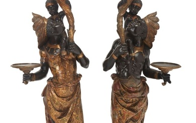 A pair of Venetian carved wood figural sculptures