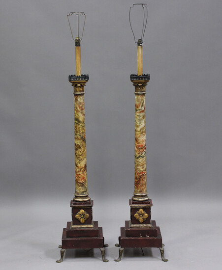 A pair of early/mid-20th century painted faux marble and gilt painted lamp standards of classical co