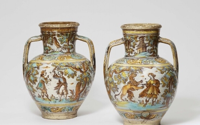 A pair of large Spanish faience ewers