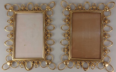 A pair of late 19th / early 20th century brass photo frames