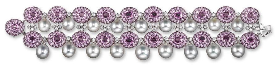 A pink sapphire and diamond bracelet, the two...