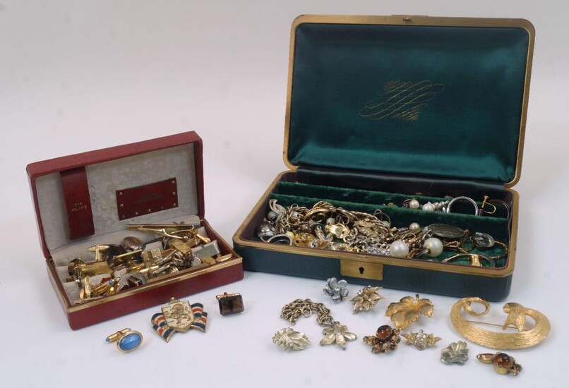 A quantity of costume jewellery and accessories, comprising various clip earrings with costume pearls, pendants, and brooches including a brushed gold effect brooch stamped 'B.S.K' to the reverse, housed in a felt lined gilt rim box, together with...