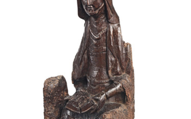 A rare 15th/early 16th century carved walnut figure, French, Saint Anne Teaching the Virgin to Read