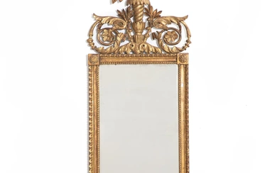 A richly carved Altona Louis XVI giltwood mirror. Ca. 1780. H. 140...
