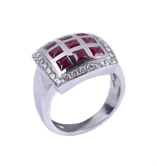 A ruby and diamond panel ring
