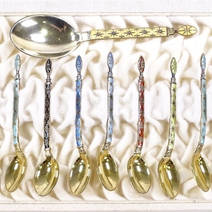 A set of 12 Norwegian sterling silver-gilt and coloured enam...