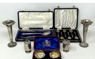A set of six silver coffee spoons, cased, a pair of salts, a...