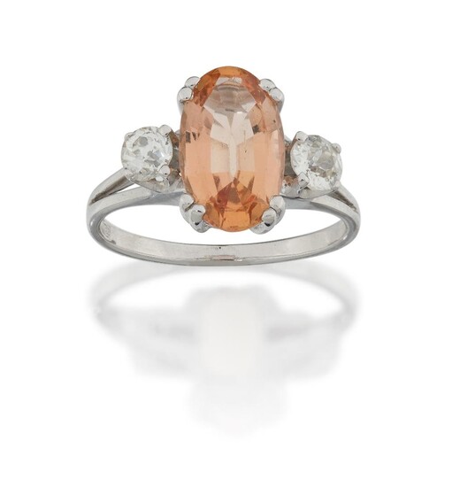 A topaz and diamond ring, the single oval mixed-cut sherry-coloured topaz in four claw-mount, to brilliant-cut diamond single stone shoulders and plain hoop, the hoop stamped CRLO, 750, approx. ring size M