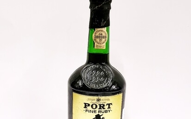 A vintage bottle of Sandeman fine ruby port.