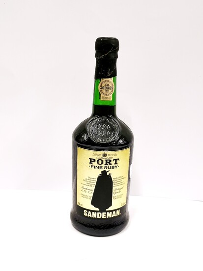 A vintage bottle of Sandeman fine ruby port.