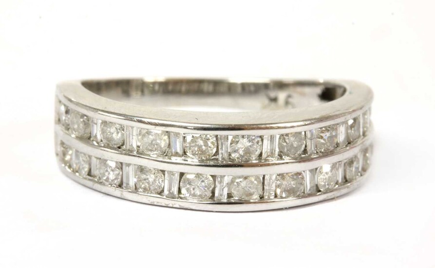 A white gold diamond half eternity ring