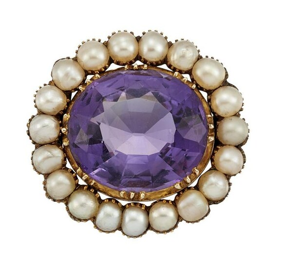 AN AMETHYST AND HALF PEARL BROOCH The oval-cut