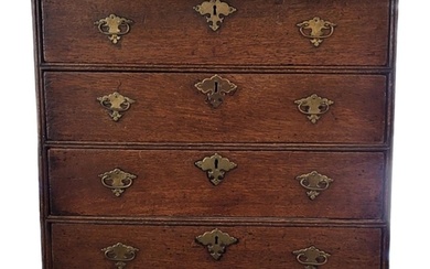 AN EARLY 18TH CENTURY OAK CHEST OF FOUR LONG DRAWERS Fitted ...