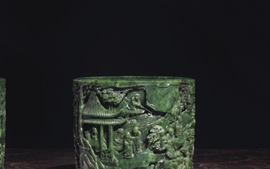 AN IMPERIAL FINELY-CARVED AND RETICULATED SPINACH-GREEN JADE BRUSH POT