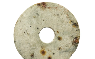 AN OPAQUE MOTTLED OLIVE-GREEN JADE DISC, BI CHINA, NEOLITHIC PERIOD, 3RD MILLENIUM BC